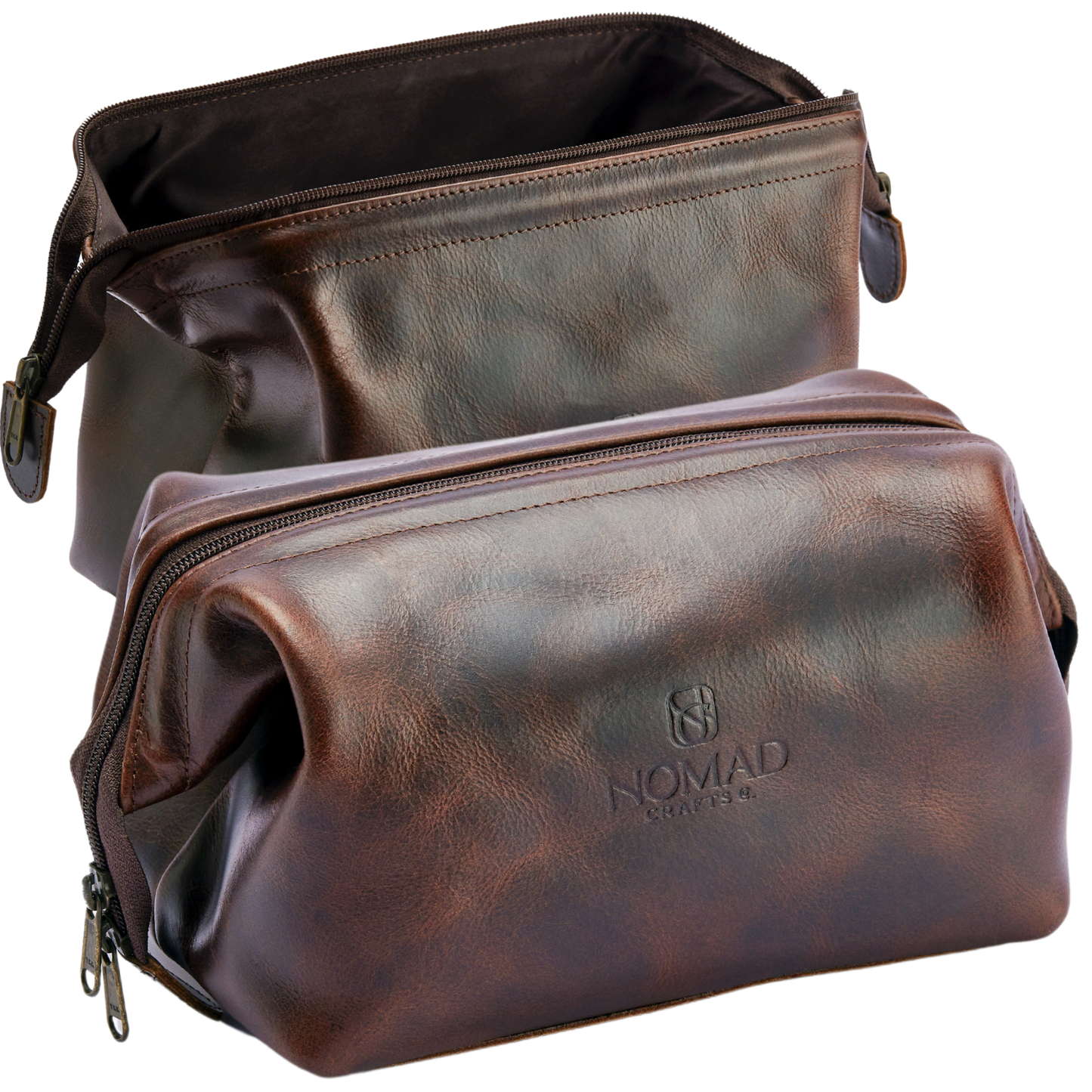 Two brown leather bags with 'Nomad' branding on a white background