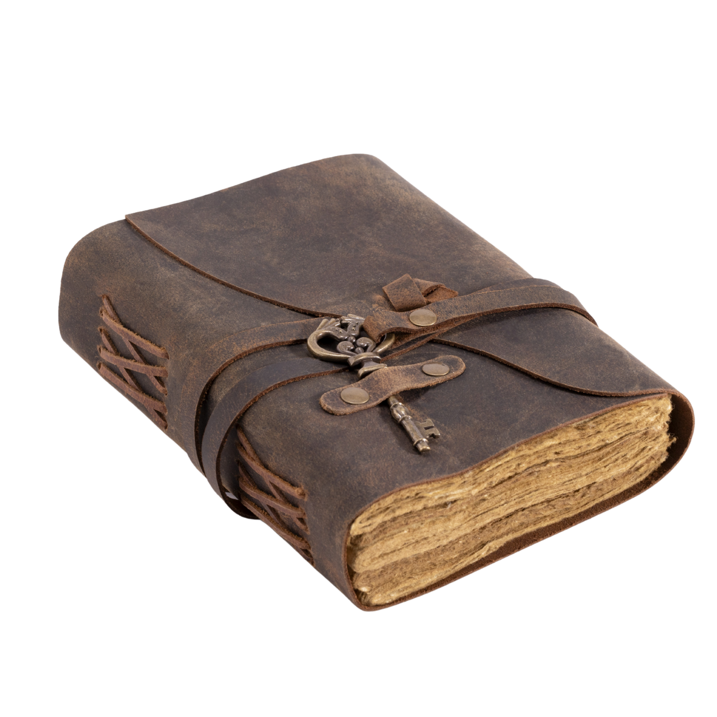 Brown leather journal with decorative strap and clasp on a white background